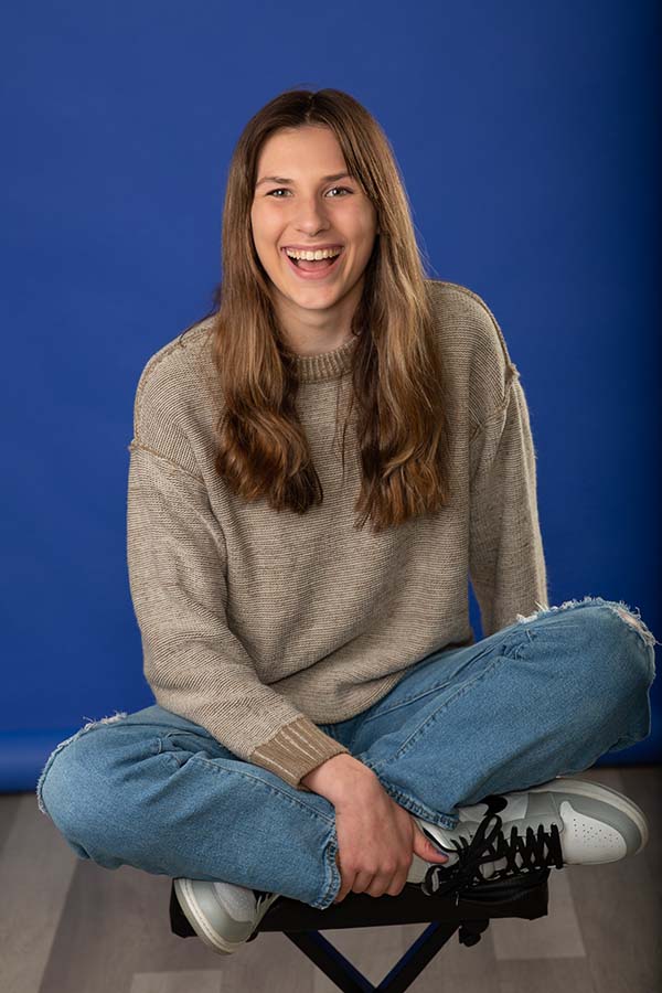 Jones family orthodontics-2-patient photo Patient photo girl on dark blue background