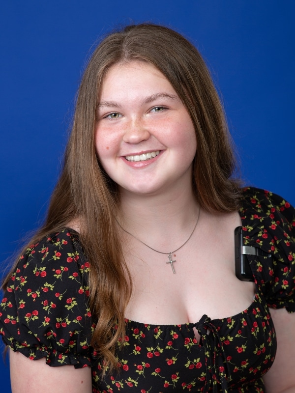 Jones-family-orthodontics-patient-photos-7 Jones family orthodontics patient photo shoot young lady smiling with cross necklace