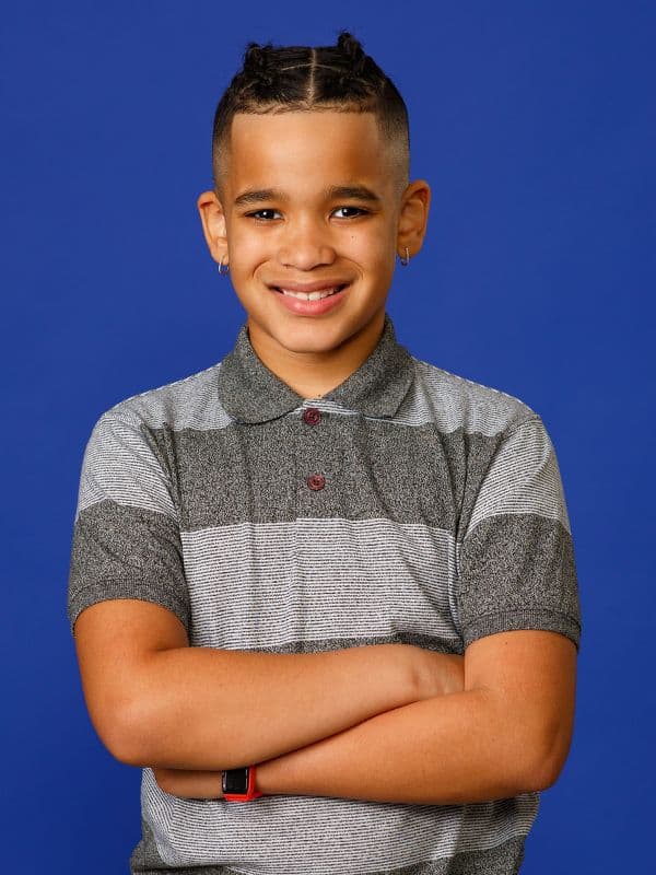 Orthodontic-patient-smiling-straight-teeth Orthodontic patient smiling after treatment