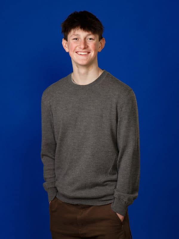 Teen-smiling-after-orthodontic-treatment Straight teeth after braces