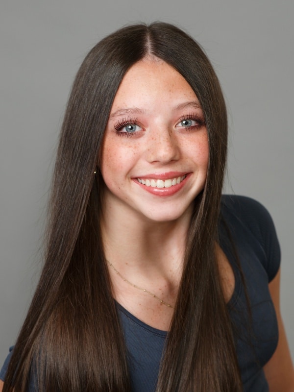 Jones-family-ortho-patient-portrait-1 Female patient smiling