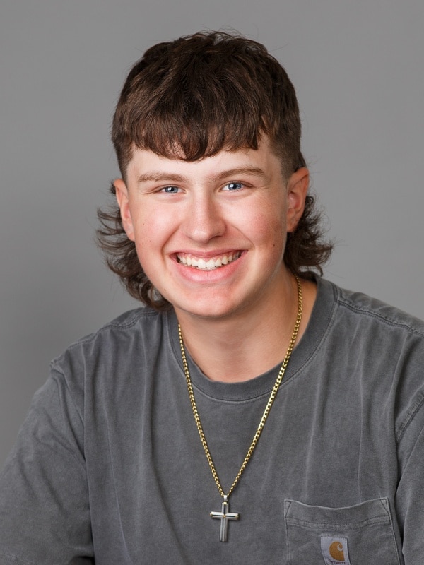 Jones-family-ortho-patient-portrait-5 Young man smiling