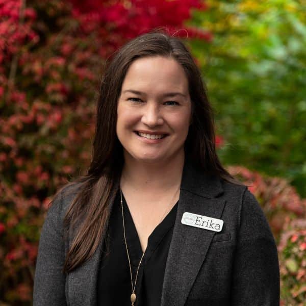 Erika-jones-family-orthodontics Erika smiling in her jones family orthodontics team portrait